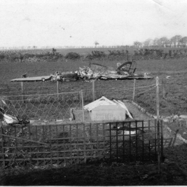 Remains of burnt out Hurricane behind Haldane Avenue.jpg